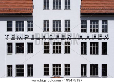 BERLIN GERMANY - JUNE 21 2017: Writing On The Wall Tempelhofer Hafen Meaning Harbor of Tempelhof In German Language In Berlin