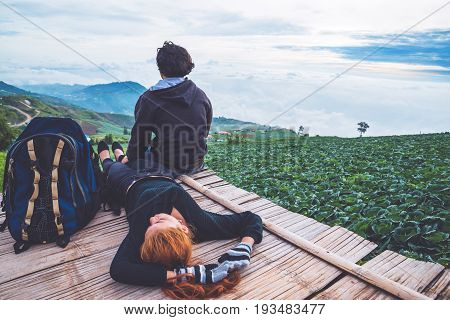 Lover Men and women Asia travel relax. Morning atmosphere nature Forests mountains. Phu Thap Buek Thailand