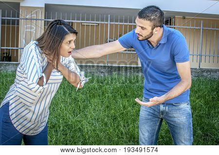 guy helping a girl chocking during feeding