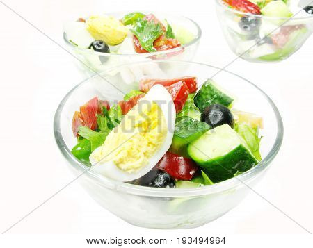 greek salad with cheese olive and tomato in little bowls
