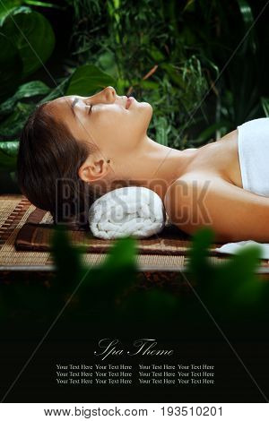 portrait of young beautiful woman in spa environment. banner, space for text.