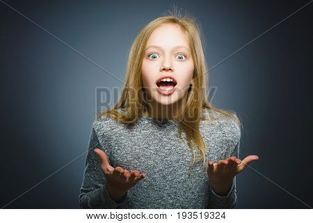 Closeup Scared and shocked little girl. Human emotion face expression.