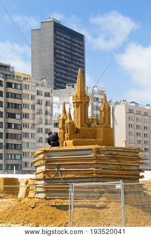 OSTENDE BELGIUM - JUNE 9 2017: Preparation for Sand Sculpture Festival. Sculptures from sand in the course of creation