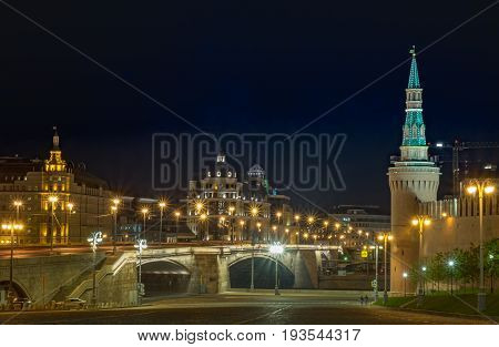 RUSSIA MOSCOW MAY 27 2017: The twightlight from the Red square behind the Saint Basil Church night view beautiful and the bridge into the Red square and Kremlin Palace.