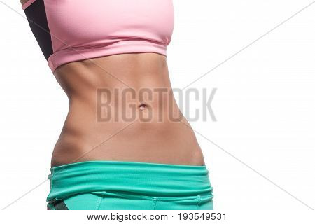 Slender narrow waist. Strong abdominal muscles Isolated white top