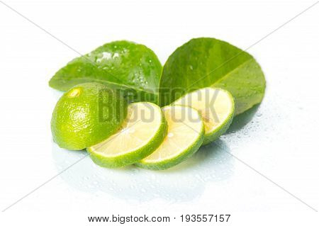 Sliced lime fruit isolated on white background with clipping path