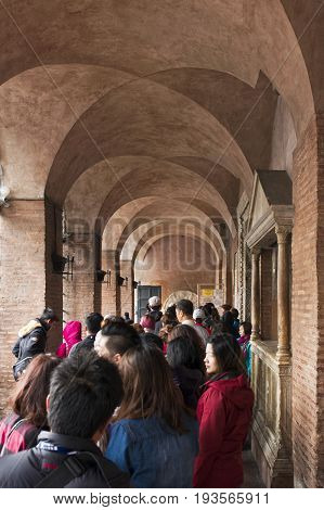 Rome Italy - October 01 2015. Tourists waiting to see the famous Mouth of Truth at Basilica of Santa Maria in Cosmedin in Rome Italy.