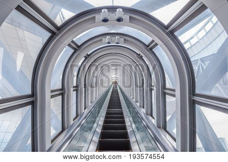 OsakaJapan - November 29 2015 : View of the spectacular escalator in Umeda Sky Buildinga modern high rise skyscraper in the Kita district of Osaka in Japan.
