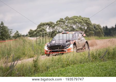 Mikolajki, Poland - 1 July 2017: Mads Ostberg and his codriver Ola Floene M-Sport World Rally Team in a Ford Fiesta WRC race in the 74nd Rally Poland, on July 1, 2017 in Mikolajki, Poland.