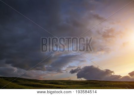Sunset in the steppe a beautiful evening sky with clouds plato Ukok no one around Altai Siberia Russia