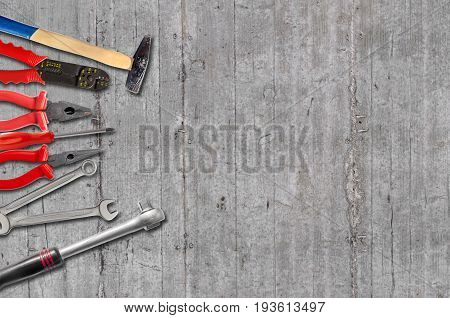 New rusty mechanic tools on concrete background