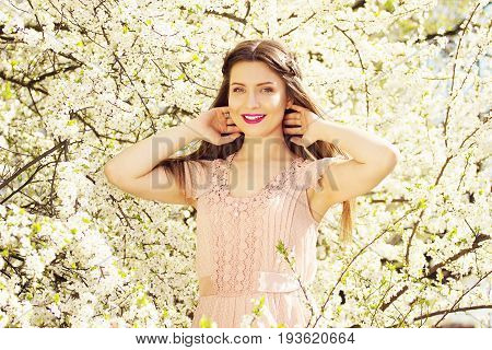 Natural Beauty. Portrait Of Smiling Young And Beautiful Long-haired Girl In Pink Dress Standing In F