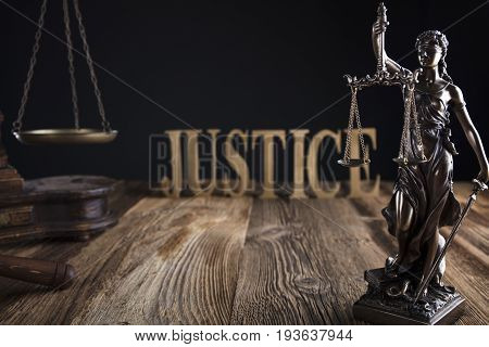 Justice concept, Themis, gavel and scale on wooden table.