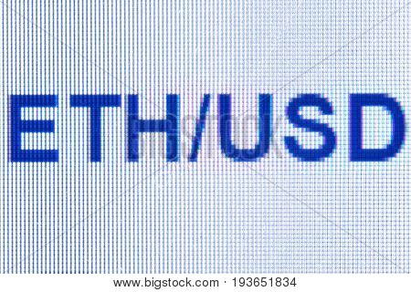 A pair of etherium dollar on the monitor screen. Blockchain technology