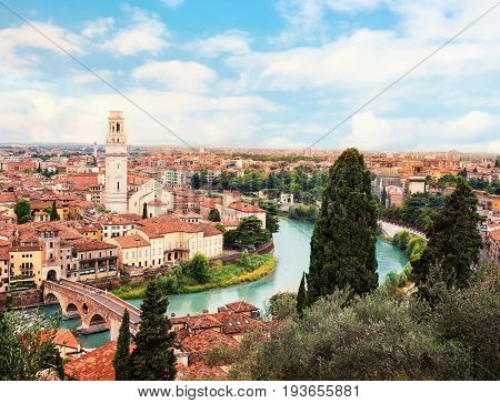 Verona Italy. Panoramic view to Bridge Ponte Pietra in Verona. Beautiful Sunny summer day panorama and blue sky may use as postcard or wall paper