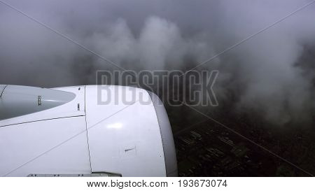 Airliner is flying in a bad weather conditions. Non-flying weather flight.