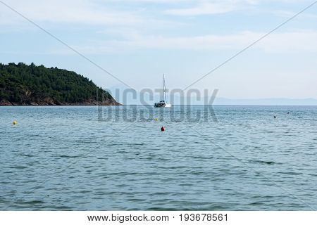 Boat in mediterranean sea near the coast of greek island Thasos