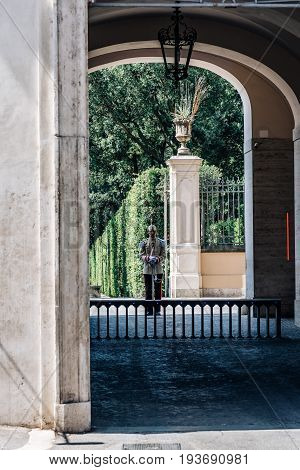 Rome Italy - August 18 2016: Soldier guarding the door of The Quirinal Palace. It is a historic building in Rome official residence of the President of the Italian Republic.
