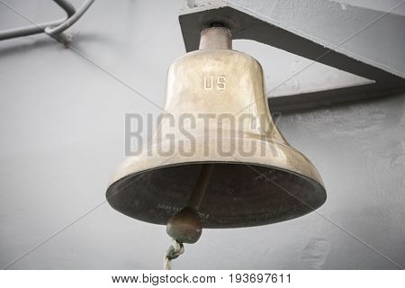 Ship Tour USS Kearsarge (LHD 3) Wasp-class amphibious assault ship: U.S. engraved on the brass bell on flight deck of the USS Kearsarge (LHD 3). Fleet Week NEW YORK MAY 25 2017.