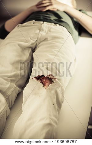 Teenage Boy Awaiting Triage At A Hospital