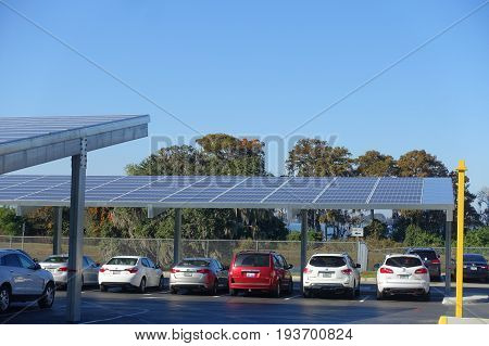 HOUSTON, USA - JANUARY 12, 2017: Some cars parked, with some solar panel protecting from the sun in Legoland park, Legoland is a theme park based on the popular LEGO brand of building toys.