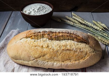 Homemade Baked Bread Flour And Wheat On Light Wooden Background