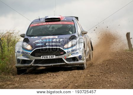 Mikolajki, Poland - 1 July 2017: Eric Camilli and his codriver Benjamin Veillas   in a Ford Fiesta R5 race in the 74nd Rally Poland, on July 1, 2017 in Mikolajki, Poland.