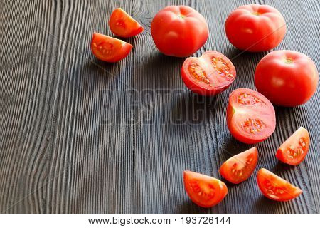 Juicy ripe tomatoes. Ingredients for tomato sauce. Selective focus. Copy-space composition