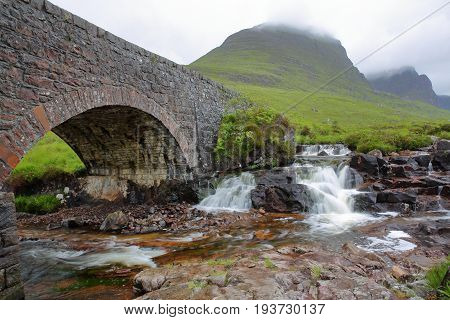 An old bridge and the river Russel on the road leading to the Bealach na Ba pass near Applecross in the western part of the Northern Highlands, Scotland, UK