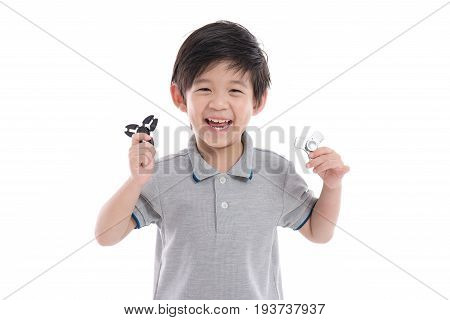 Asian Chld  Holding Two Fidget Spinners