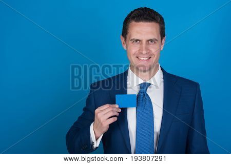 Happy Man Smiling With Business Or Bank Card