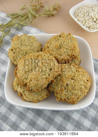 Freshly baked rolled oats cookies in a bowl