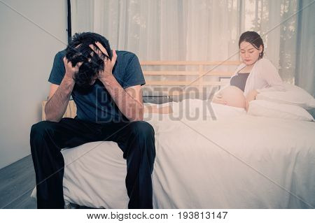 The man are tense with the responsibility to make pregnant woman.