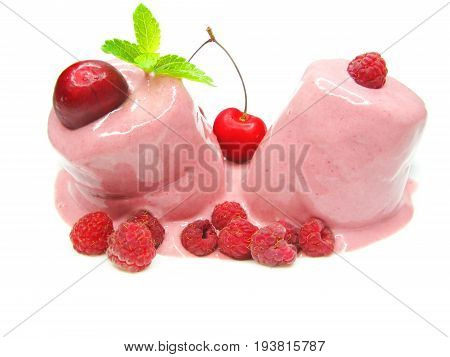 pink fruit ice-cream with cerry and raspberry berries decorated by mint