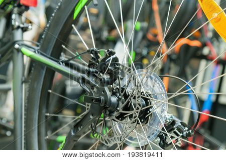 Disc brake on the rear wheel of a black bicycle