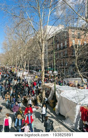 Madrid Spain february 28 2010: Scene from El Rastro flea market in Madrid Spain. El Rastro is held in La Latina neighborhood every Sunday and it's the most important market in Madrid.