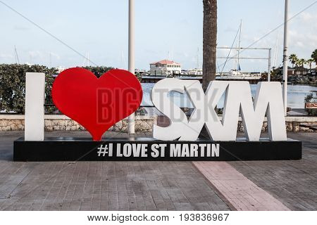 MARIGOT-AUGUST !: Sign and statue I love St Martin in Marigot, seen in Marigot , St.Marten on August 1, 2015