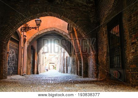 Ferrara, Italy - June, 30, 2017: district of a medieval houses in a center of Ferrara, Italy