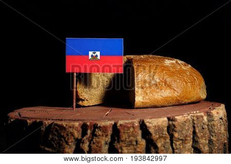 Haitian Flag On A Stump With Bread Isolated