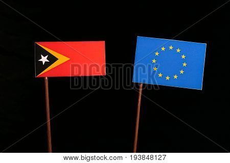 East Timorese Flag With European Union (eu) Flag Isolated On Black Background