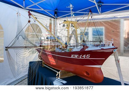URK THE NETHERLANDS - MAY 27 2017: Scale model of fishing vessel at harbor of Urk during a local fishing day event