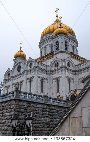 MOSCOW RUSSIA - MAY 29 2017: View of the Christ the Savior Cathedral from the door at metro.It's a Orthodox church with golden domes at Moscow.Famous christian landmark in Russia