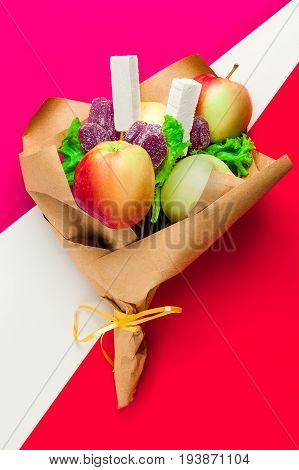 Bouquet of apples lettuce marmalade and cardboard