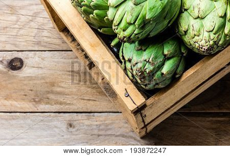 Artichoke. Box Of Fresh Artichoke. Harvest Concept. Copy Space