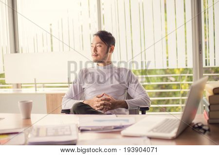 Young Asian Worker Having Resting After Solving Work Man With Freelance Worker Concept.