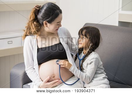 Little Cute Girl Using Stethoscope Check Stomach Her Mother
