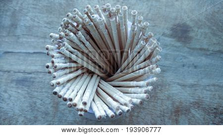 abstract wooden tooth picks on wood background