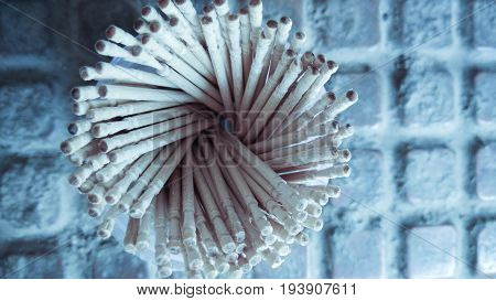 abstract wooden tooth picks on wood background