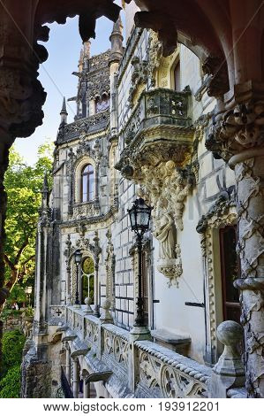 SINTRA, PORTUGAL - JUNE 6 2017: Palace Quinta da Regaleira Sintra Portugal. Palace with symbols related to alchemy Masonry the Knights Templar and the Rosicrucians shown at sunset. Masterpiece of Neo-Manueline architecture style