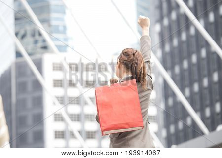 Woman Show Hand With Success Emotion At City Place Woman Shopping Concept.
